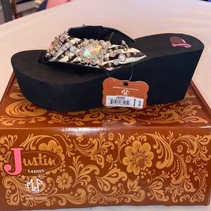 Size 7 western flip flops by Justin Ladies from Cavenders Bought but never worn.